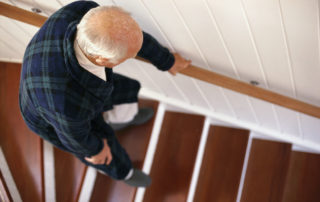 old-man-walking-down-stairs.jpg